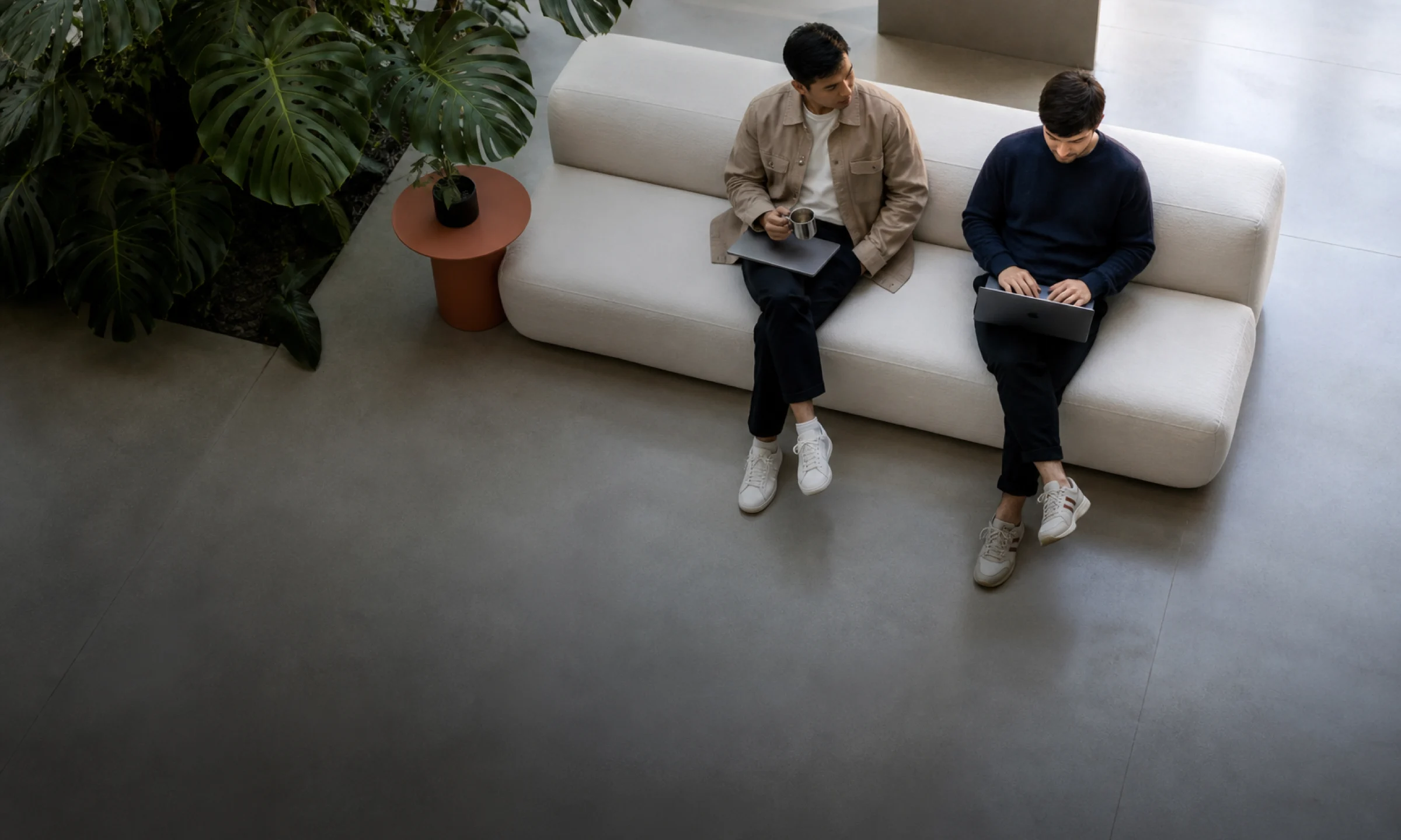 Team working together in a modern studio lounge